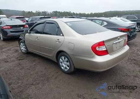 2003 Toyota Camry Le z USA, uszkodzony, nr VIN JTDBE32KX30178027